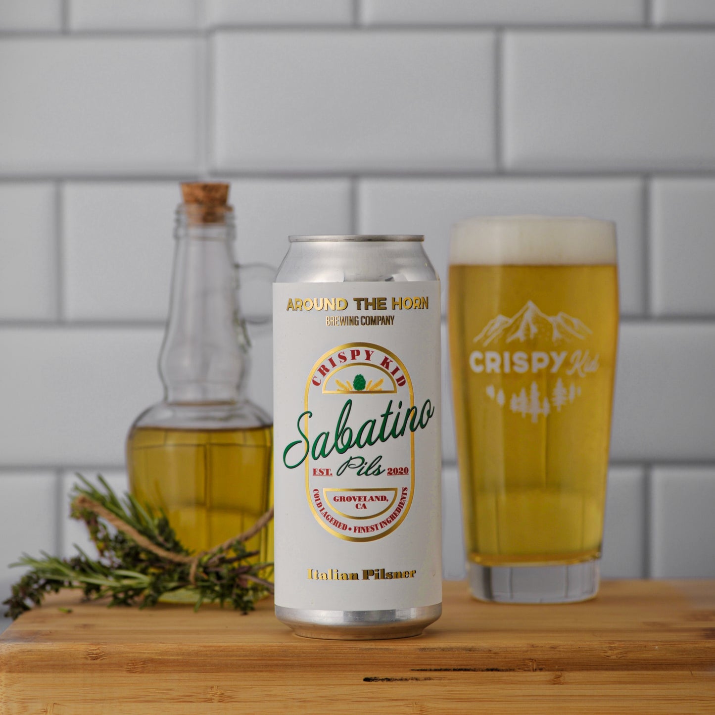 Can of Sabatino Pils with glass of beer