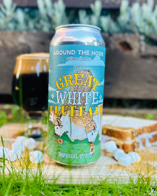 Beer can in the foreground with stout glass in the background